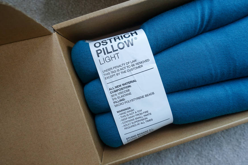ostrichpillow light versatile pillow in box
